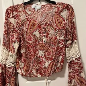 Red patterned long sleeve blouse